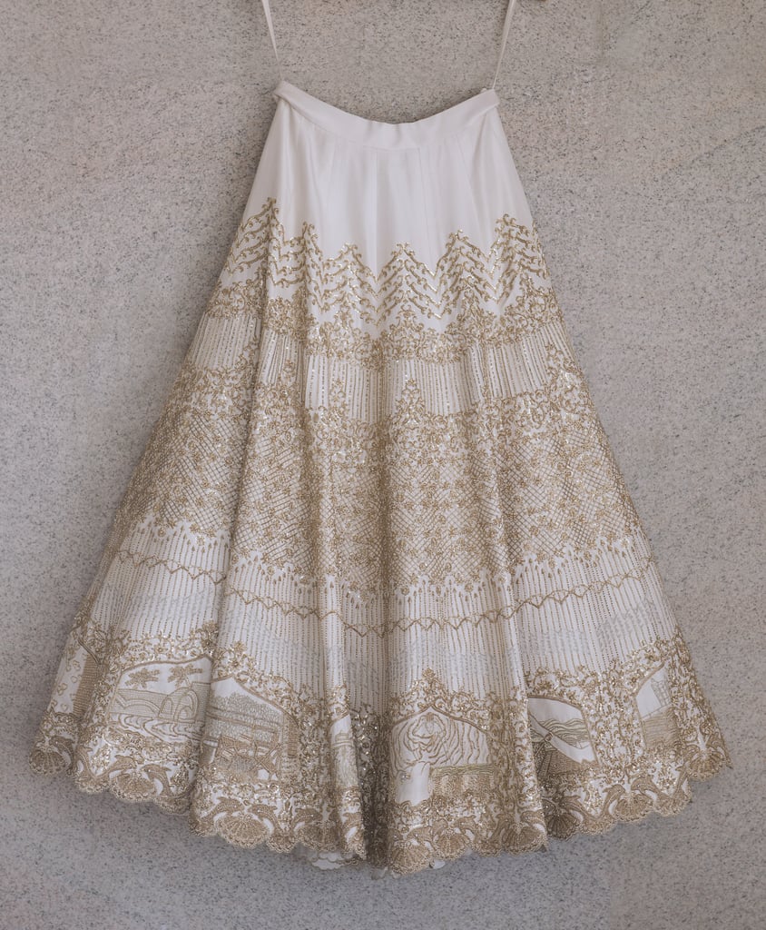 Bride Embroidered Love Story on Wedding Dress