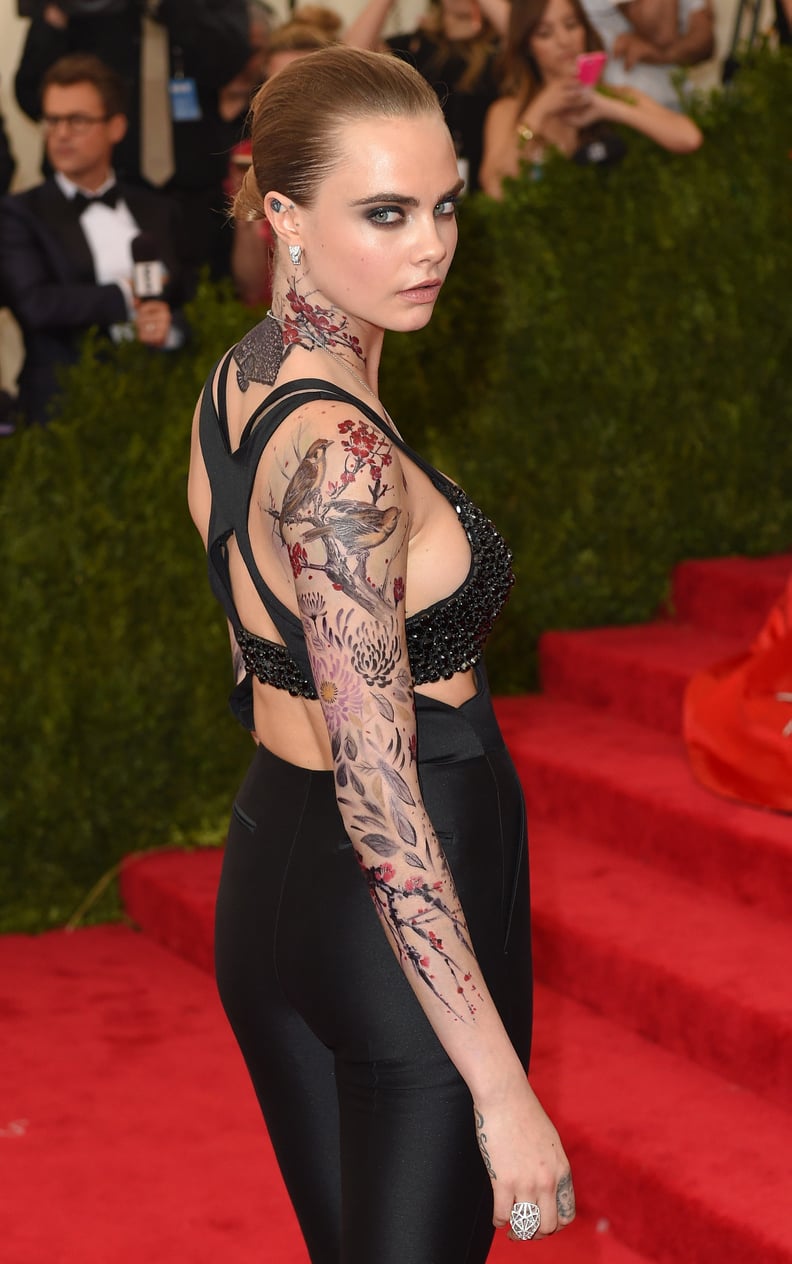 Cara Delevingne's Tattoos at the 2015 Met Gala
