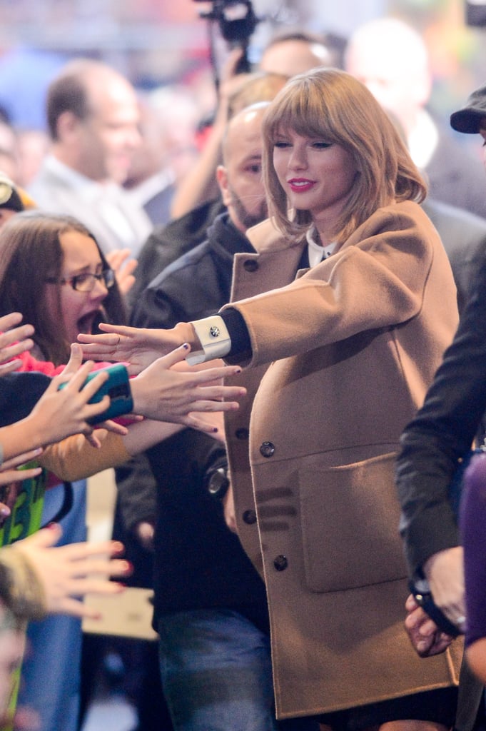 Taylor Swift greeted fans in NYC on Monday.