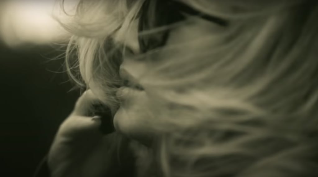 Adele on the Phone in "Hello"