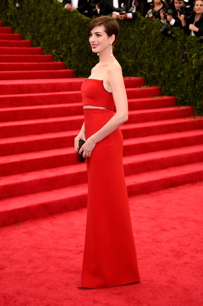 Anne Hathaway's red gown matched the carpet's bright hue.