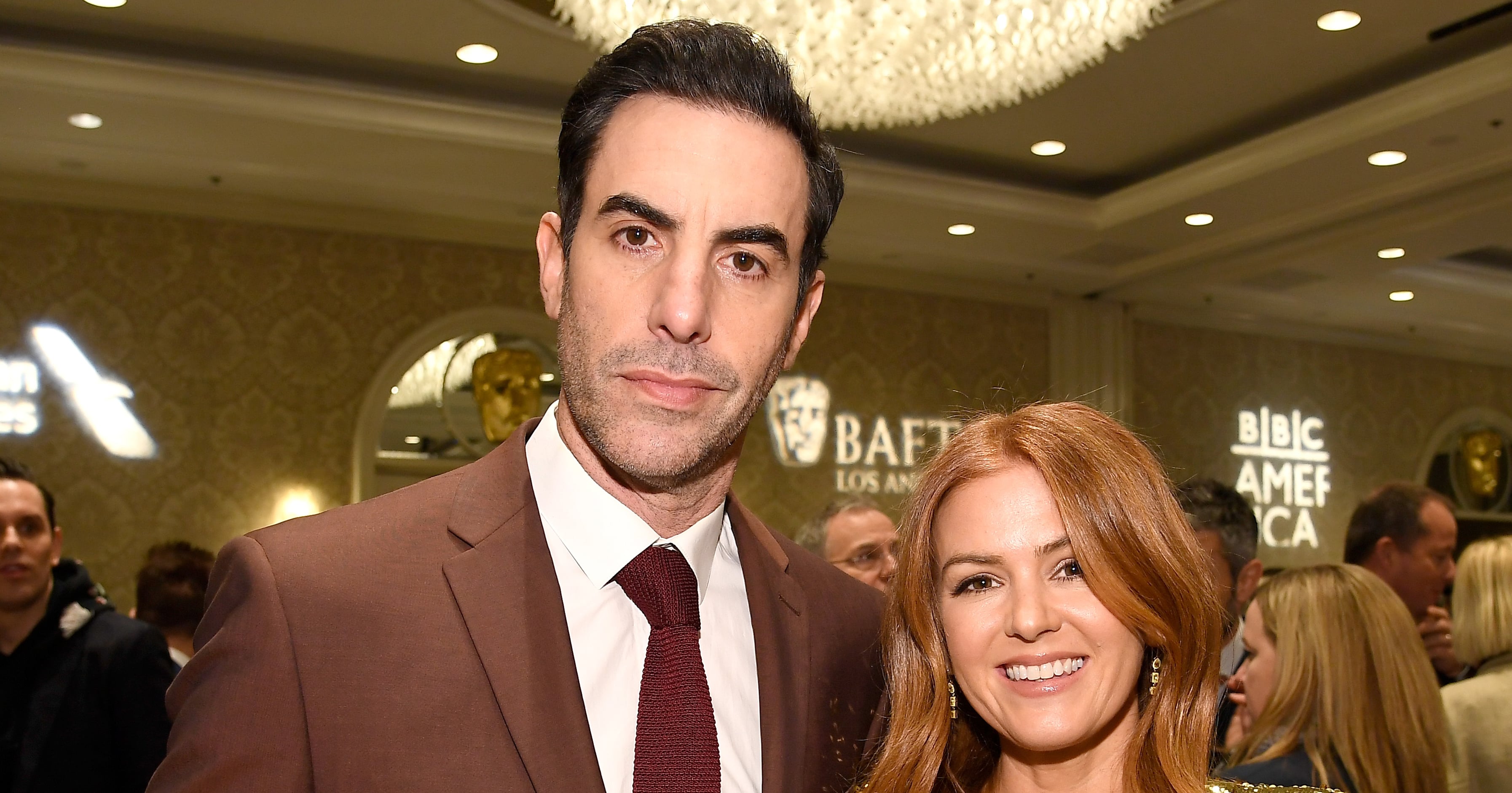 Isla Fisher and Sacha Baron Cohen Share a Kiss in Photos From Vacation to Greece