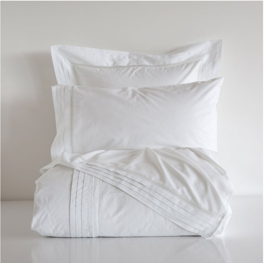 Lace percale bedding with pleated inserts ($35-$60, originally $70-$119)
