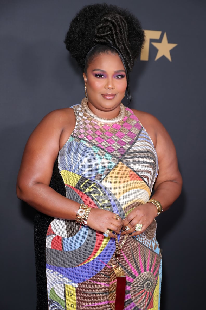 lizzo gold dress Lizzo Wore A Finger Wave Mullet to the 2022 BET Awards