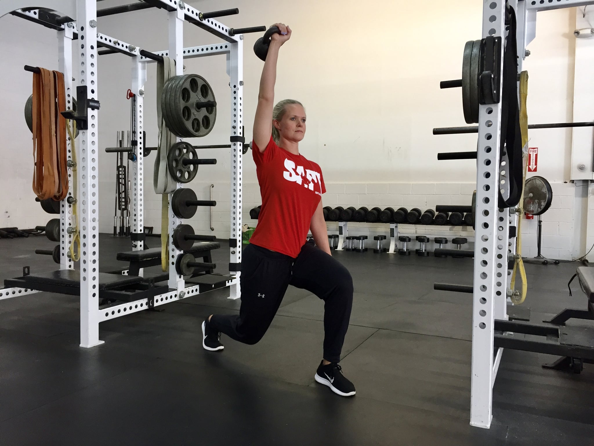 Split Squat Kettlebell Pass to Press 9 Kettlebell Moves to Burn Major Calories and Build Some Muscle | POPSUGAR Fitness Photo 8
