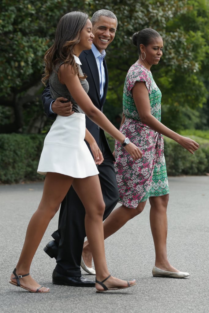 Malia and President Obama were all smiles as they left the White House with Michelle in August.