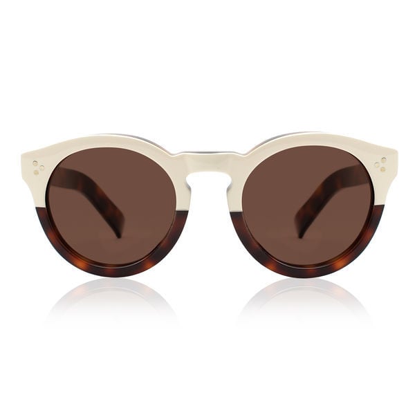 "While I'll always love my classic black wayfarers, a poppy two-toned style like the Illesteva Leonard II ($290) really speaks to me this time of year, when my outfits get a little more festive and fun." — SW