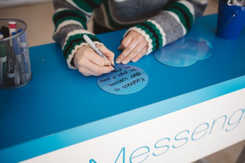 Participants were encouraged to write messages to place on a blank wall.