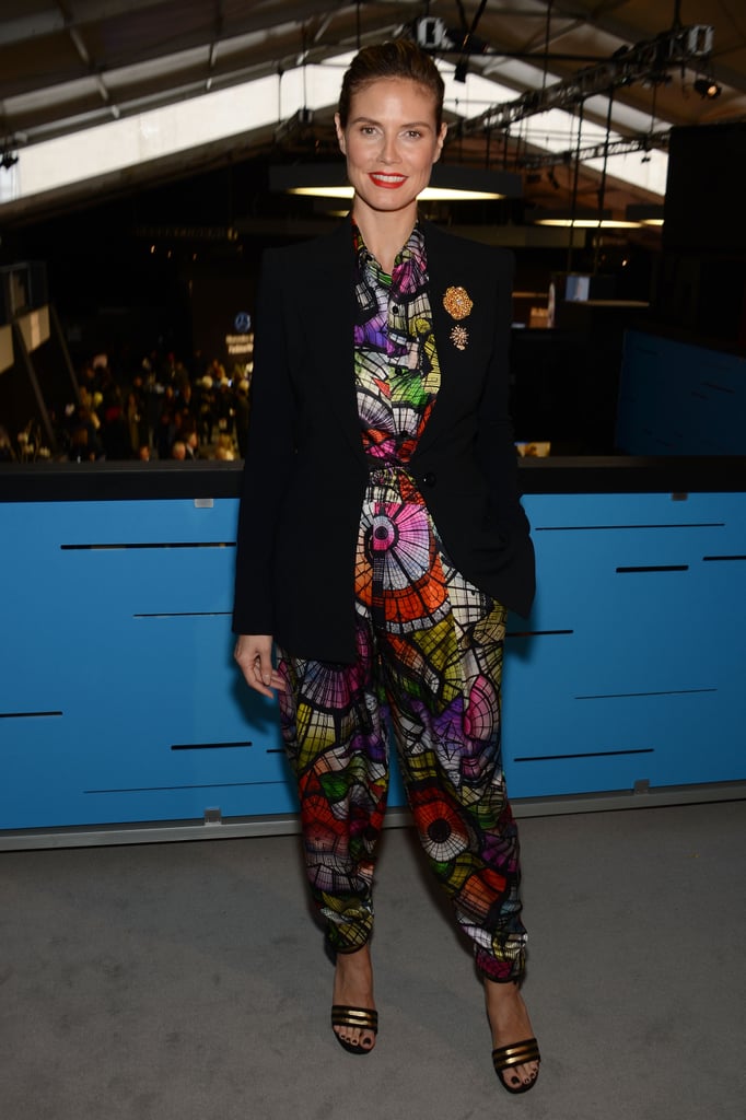 Heidi Klum's colorful kaleidoscope jumpsuit brought major color to the Project Runway catwalk.
Heidi Klum's colorful kaleidoscope jumpsuit brought major color to the Project Runway catwalk.