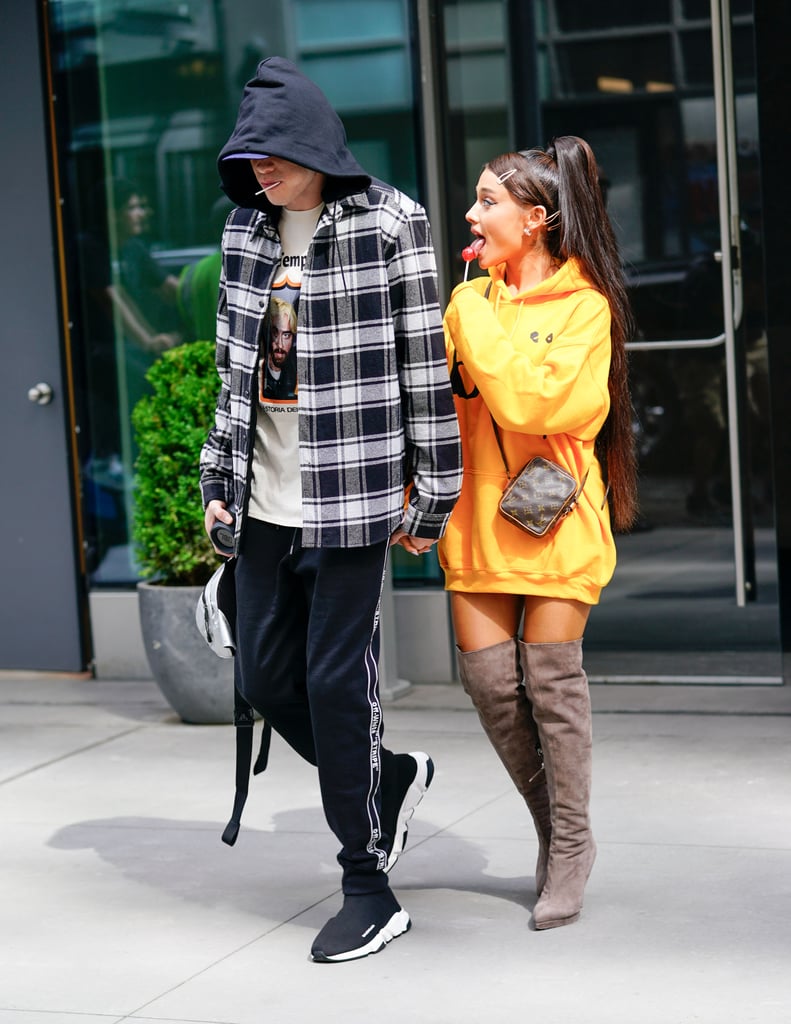 Ariana stepped out with Pete Davidson in June, sporting a gold Cloney Benji hoodie, custom Giuseppe Zanotti boots, a Louis Vuitton minibag, and Harry Kotlar jewels.