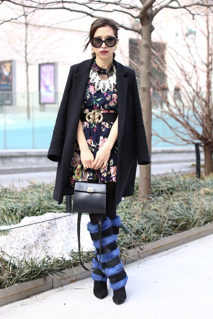 High-impact fur boots furthered this showgoer's outfit whimsy.
High-impact fur boots furthered this showgoer's outfit whimsy.