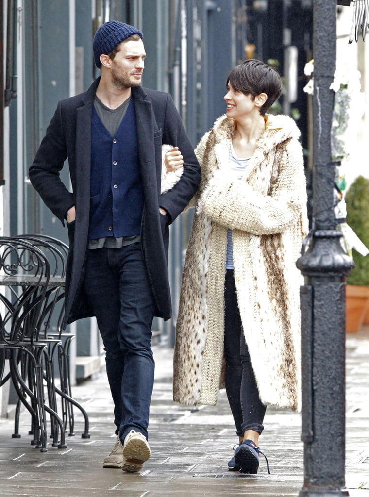 Jamie Dornan was quite the gentlemen for his wife, Amelia Warner, as the couple took a casual stroll through London on Wednesday.