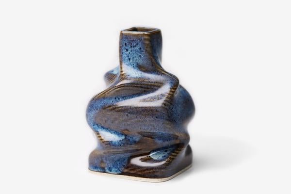 This vase is abstract and will look beautiful everywhere. Fill it with flowers before giving it to your mom.
Bre & Co. Folded Bud Vase ($49)