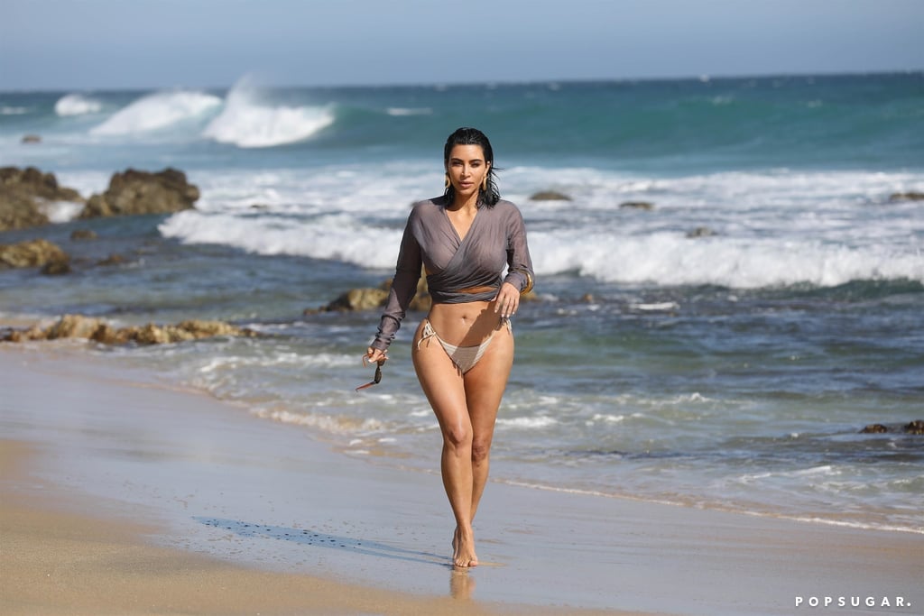 Kim Kardashian is soaking up the last few days of summer. On Tuesday, the 39-year-old mogul enjoyed some R & R when she hit the beach in Malibu, CA. Clad in a wet crop top and beige bikini bottoms, Kim put on a sultry display as she walked on the sand. That same day, Kim announced on Instagram that Keeping Up With the Kardashians is ending after 20 seasons. 
"After what will be 14 years, 20 seasons, hundreds of episodes and numerous spin-off shows, we are beyond grateful to all of you who've watched us for all of these years — through the good times, the bad times, the happiness, the tears, and the many relationships and children," she said in her statement. "We'll forever cherish the wonderful memories and countless people we've met along the way."
While Kim didn't reveal the actual reason for the cancellation, she did state that the family made the difficult decision together. Kris Jenner also recently told Ryan Seacrest in an interview that it was just "the right time" for KUWTK to end. Luckily, we still have two more seasons left of the beloved reality TV series, so let's enjoy it while we still can. 

    Related:

            
            
                                    
                            

            Dangerous Curves Ahead: 70 of Kim Kardashian&apos;s Hottest Swimsuit Photos