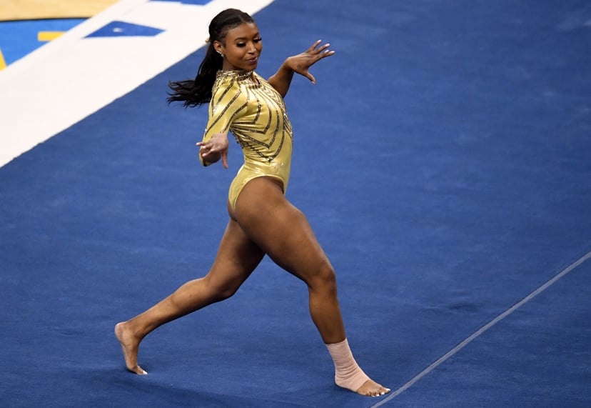 Los Angeles, CA - February 10:  UCLA Bruins gymnasts Nia Dennis competes in the floor exercise against BYU during a gymnastics meet in Pauley Pavilion on the campus of UCLA in Los Angeles on Wednesday, February 10, 2021. (Photo by Keith Birmingham/MediaNe