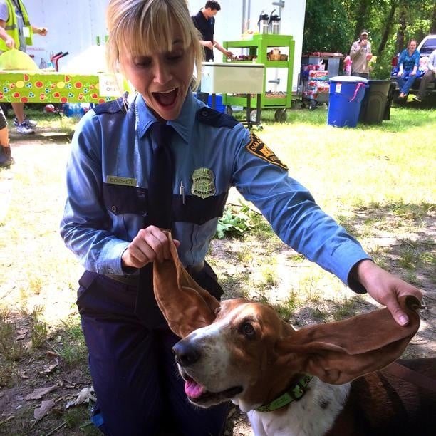 Reese Witherspoon dressed as a cop and had fun with a dog on the set of her new movie.
Source: Instagram user reesewitherspoon