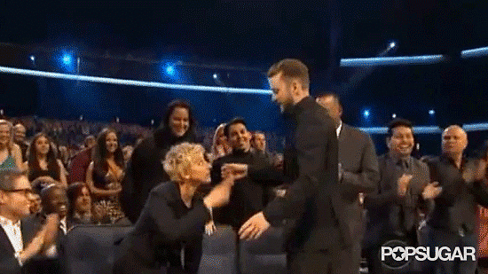 Ellen DeGeneres gave a kiss and hug to Justin Timberlake after pretending to accept his award at the Grammys.