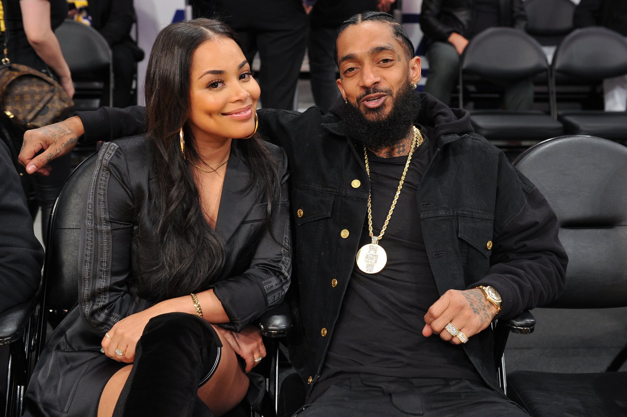 LOS ANGELES, CALIFORNIA - NOVEMBER 14: Nipsey Hussle and Lauren London attend a basketball game between the Los Angeles Lakers and the Portland Trail Blazers  at Staples Centre on November 14, 2018 in Los Angeles, California. (Photo by Allen Berezovsky/Getty Images)