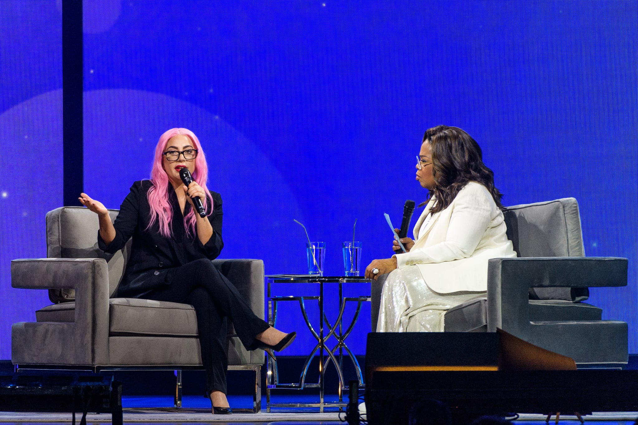 SUNRISE, FL - JANUARY 04: (EXCLUSIVE COVERAGE) Lady Gaga and Oprah Winfrey speak during the WW (Weight Watchers Reimagined) & Oprah's 2020 Vision: Your Life In Focus Tour at BB&T Center on January 4, 2020 in Sunrise, Florida.  (Photo by Jason Koerner/Getty Images for Oprah)
