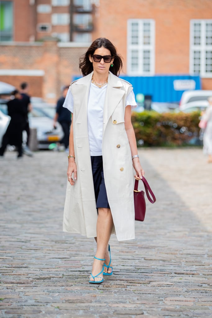 Layer a longer coat or vest over your shorts for a look that plays with proportions in the most elegant way.