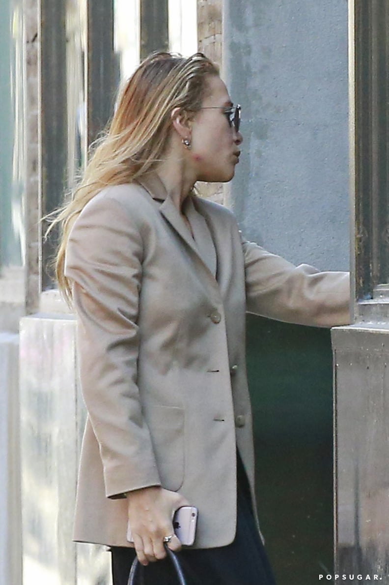 She Amped Up Her Look With a Beige Blazer and Round Sunglasses