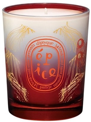 Another option for a host of a holiday party is a nice holiday-scented candle. Diptyque Spice Candle ($34).