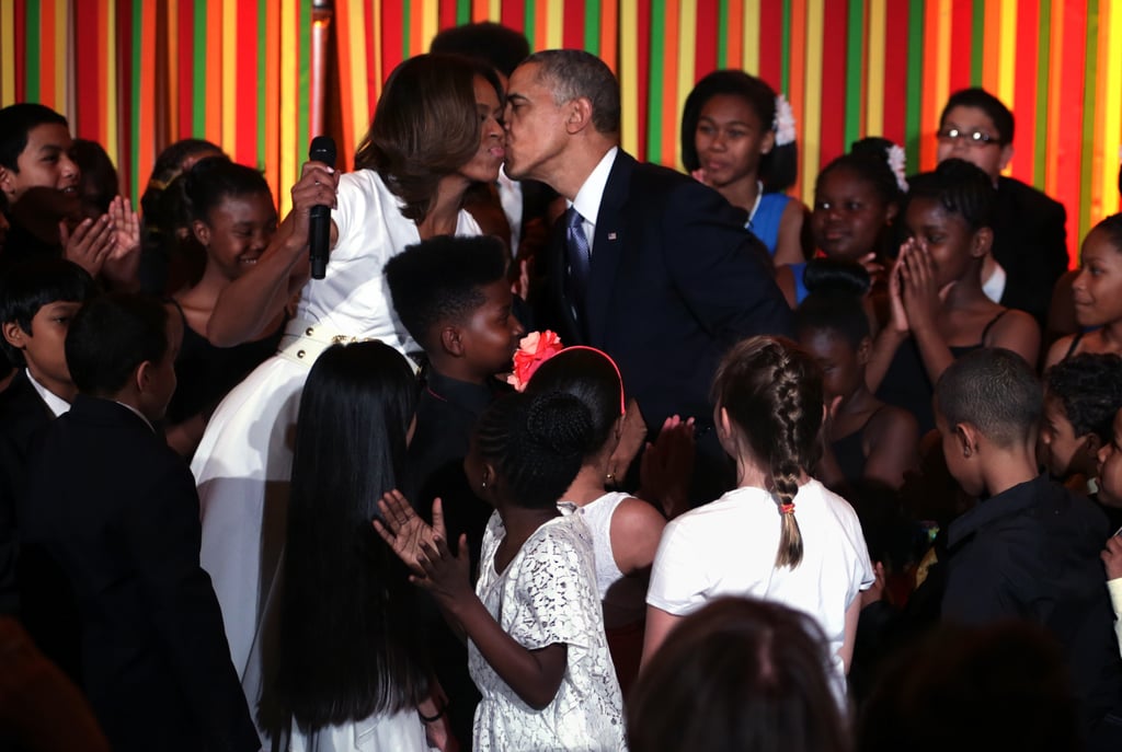 President Obama kissed First Lady Michelle Obama during a talent show at the White House in May.