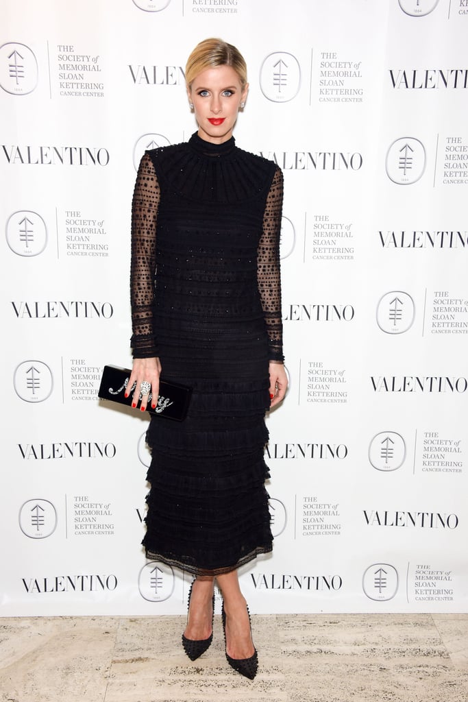 Nicky Hilton in a sheer-sleeved, tiered black dress at the Society of Memorial Sloan Kettering's Fall party.