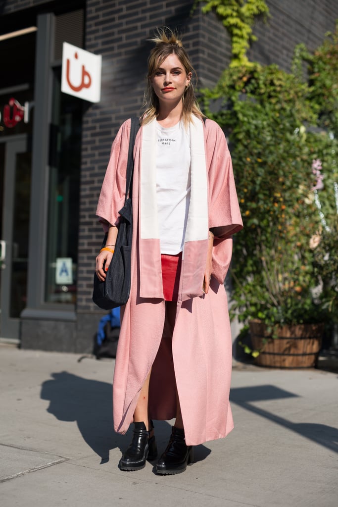 If you prefer to make pink the center of your attention in your outfit, add a pop of red elsewhere, like with your skirt. Hannah Ongley effortlessly pulled this off during Fashion Week.