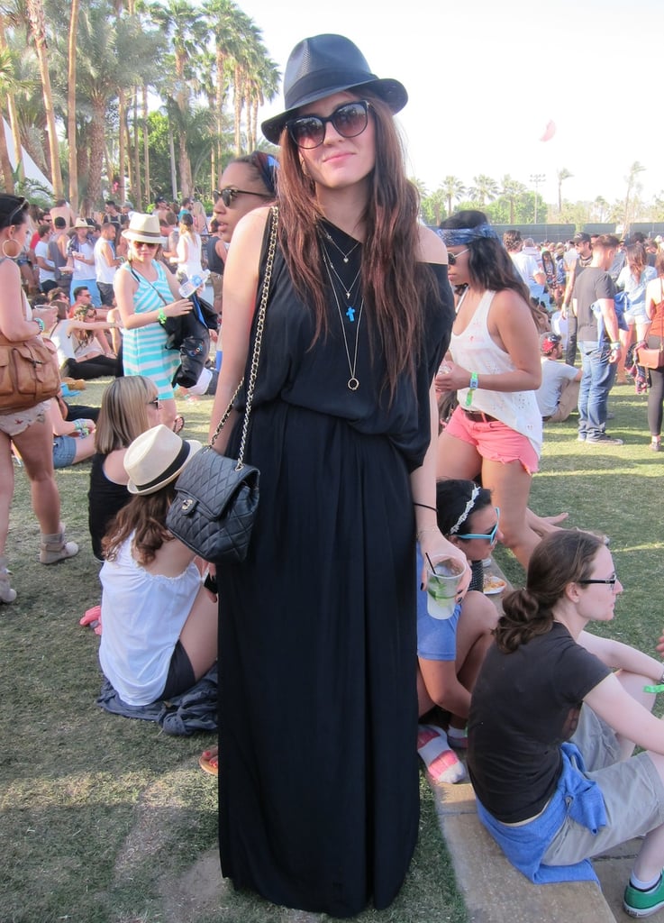 We love how this concert attendee dressed up her simple black maxi dress with a sleek Chanel bag and pretty jewels.
Source: Chi Diem Chau