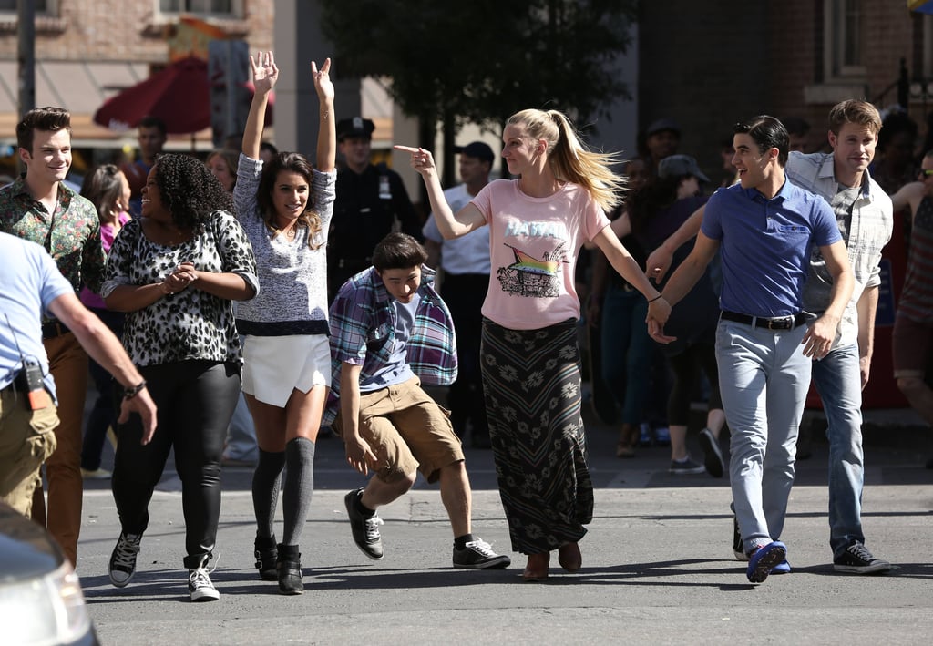 Kurt, Mercedes, Rachel, Mike, Brittany, Blaine, and Sam dance in the street.