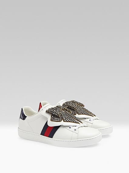 Go sweet and feminine with bow motif sneakers ($1,100).