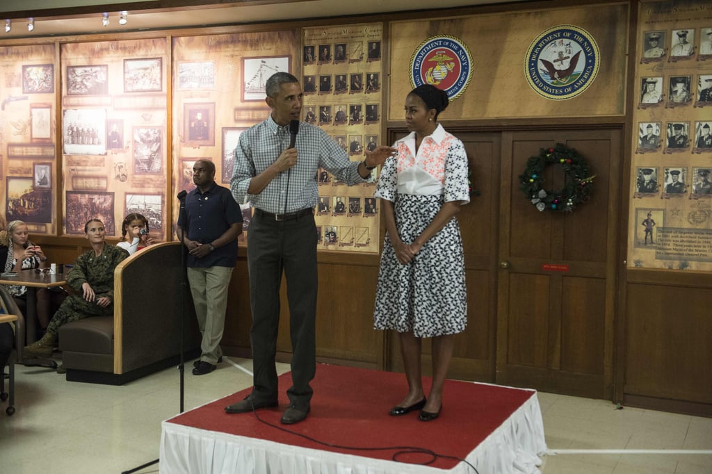Michelle wearing a printed multicolored shirt dress and flats in Hawaii.
