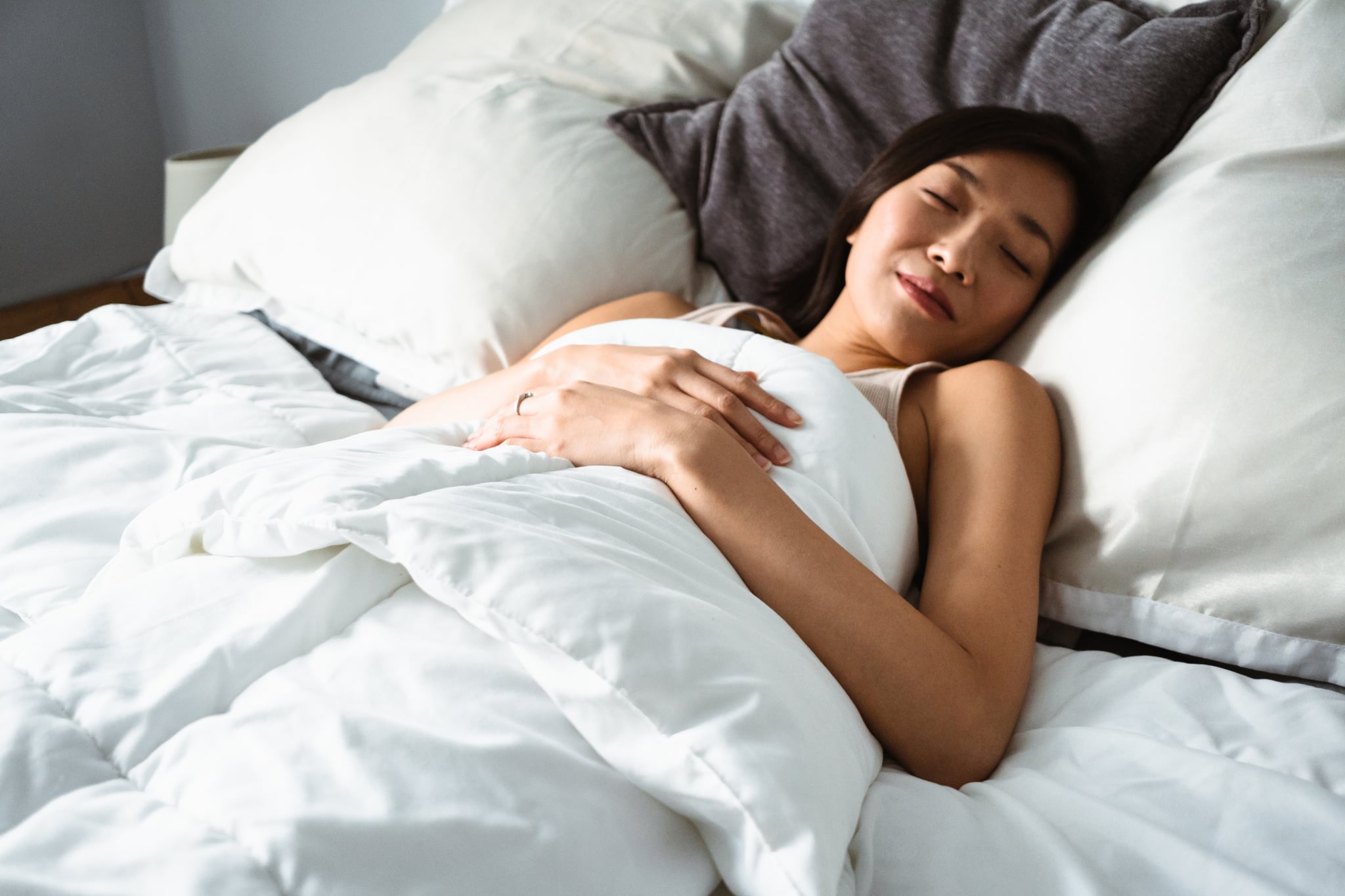 chinese woman sleeping on the bed