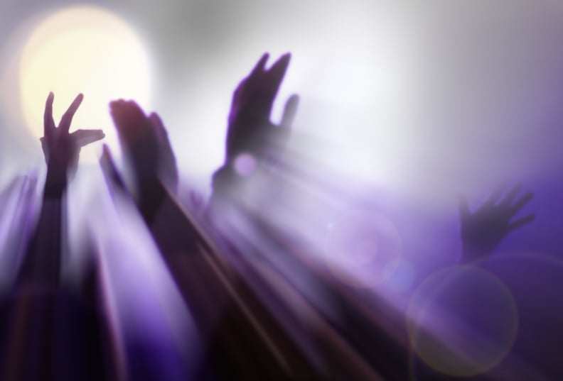 Abstract blurred hands in light