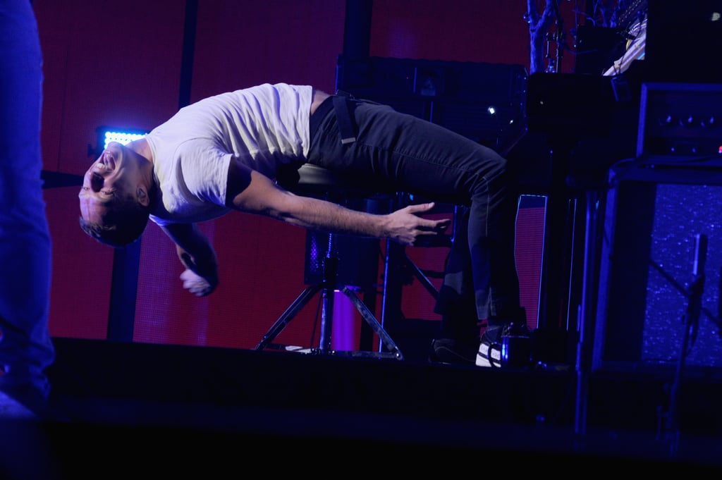 Chris Martin got a good stretch on stage.