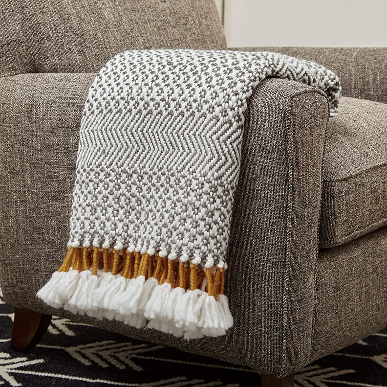 A Cozy Blanket: Rivet Modern Hand-Woven Stripe Fringe Throw Blanket