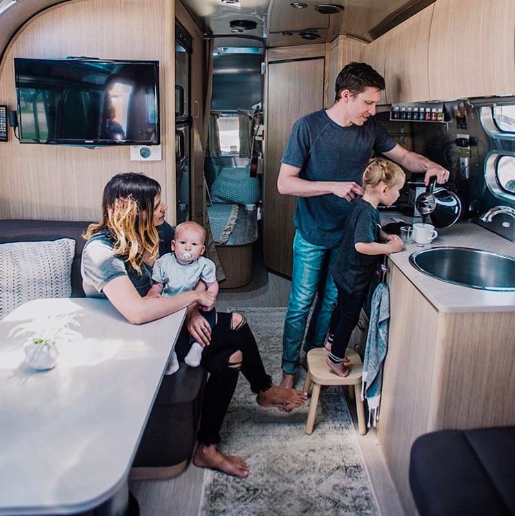 Navigating around each other in 215 square feet means we have to be really aware of one another.
"The biggest change has been the way we've grown as a family. We have adventures together that bring us closer, and being in such a small space has forced us to be really intentional with our time as a couple and with the littles," Tiffany told POPSUGAR of the best part of RV life so far. "Even the kids, as young as they are, are really connecting in this season. The space has also taught us to communicate really well; navigating around each other in 215 square feet means we have to be really aware of one another. Living more simply has helped [Jacob and I] prioritize our lives better, and we've also grown more and more adaptable."
That's not to mention the fact that living in a vehicle means being able to roam around and travel endlessly. Because Jacob works as a graphic designer and Tiffany sells essential oils, the pair were able to take their careers on the road and have a truly unique experience.
"The adventure of it has been amazing. We've seen so many amazing things during our stays in various places, and the driving days have a been a gift as well; we've gotten to see things that you can't find on postcards, the in-between places that are beautiful in their own ways."