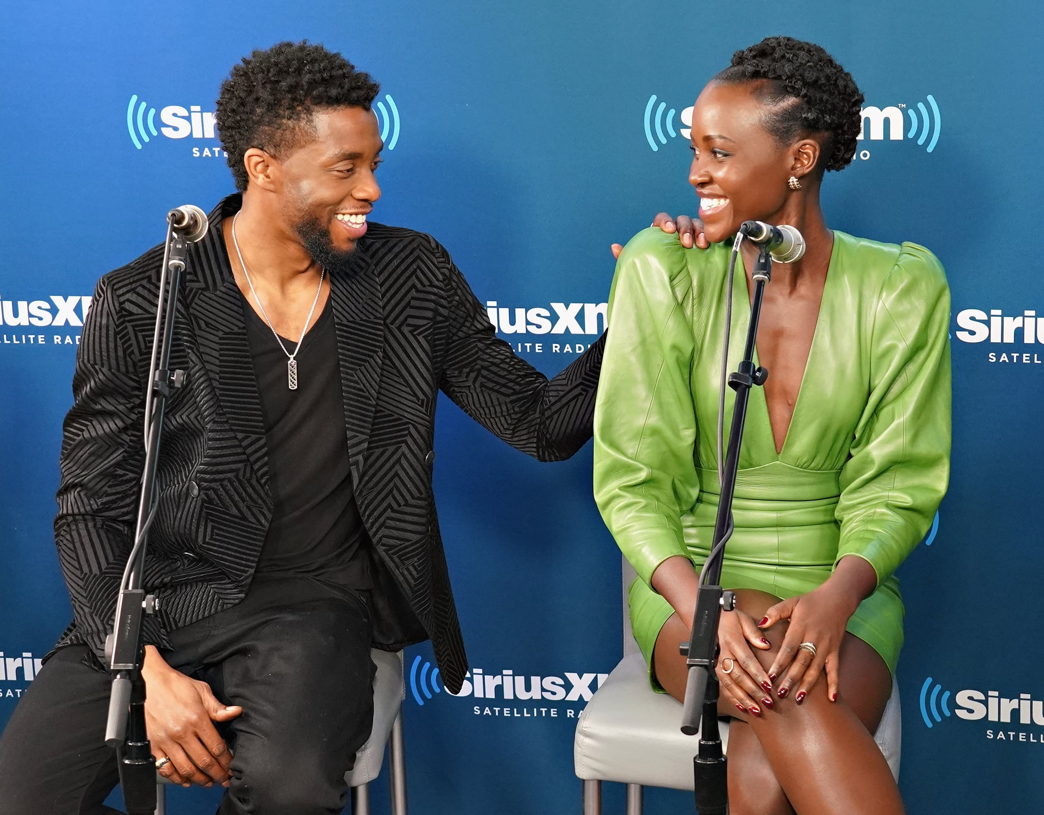 NEW YORK, NY - FEBRUARY 13:  Chadwick Boseman and Lupita Nyong'o take part in SiriusXM's Town Hall with the cast of Black Panther hosted by SiriusXM's Sway Calloway on February 13, 2018 in New York City.  (Photo by Cindy Ord/Getty Images for SiriusXM)