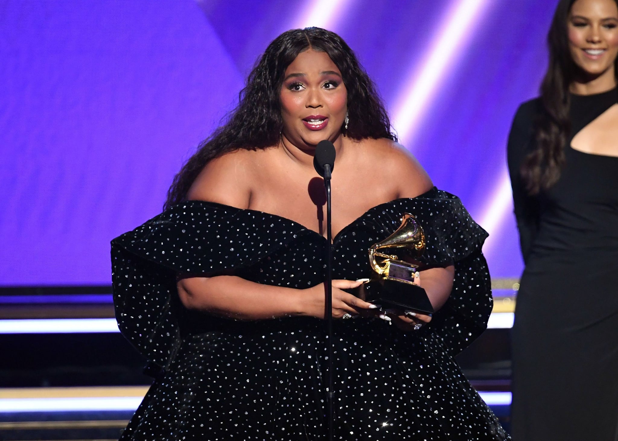 LOS ANGELES, CALIFORNIA - JANUARY 26: Lizzo accepts the Best Pop Solo Performance award for 'Truth Hurts' onstage during the 62nd Annual GRAMMY Awards at STAPLES Centre on January 26, 2020 in Los Angeles, California. (Photo by Kevin Winter/Getty Images for The Recording Academy )