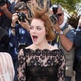 Emma Stone Battles Windy Weather at Cannes With a Big Smile