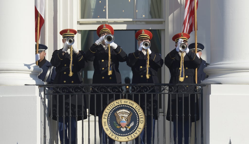 Trumpets sounded for the presidents' big entrance.
