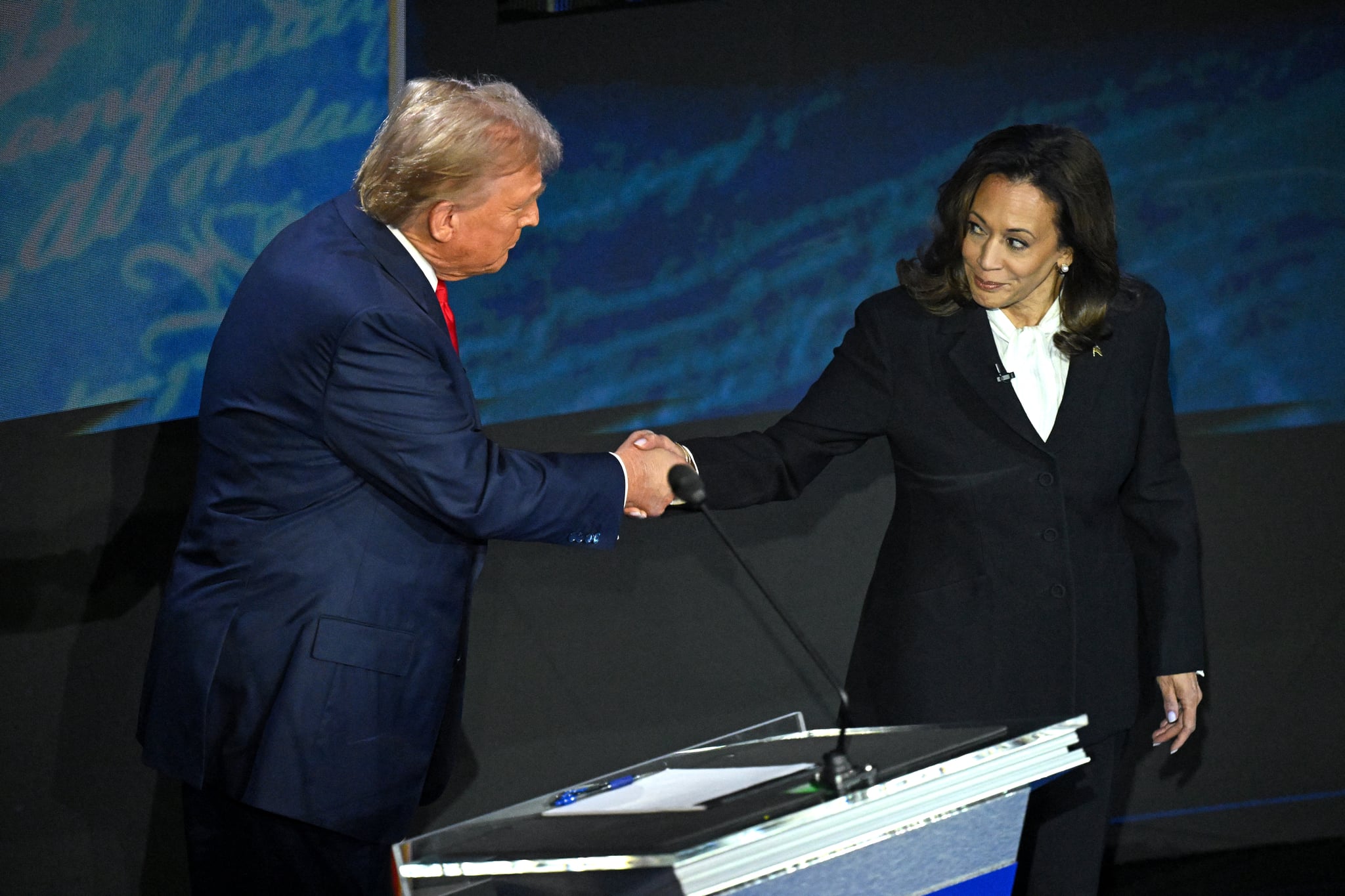 US Vice President and Democratic presidential candidate Kamala Harris shakes hands with former US President and Republican presidential candidate Donald Trump during a presidential debate at the National Constitution Center in Philadelphia, Pennsylvania, on September 10, 2024.