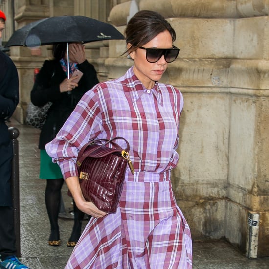 Victoria Beckham Wearing Purple Plaid Outfit With Red Boots