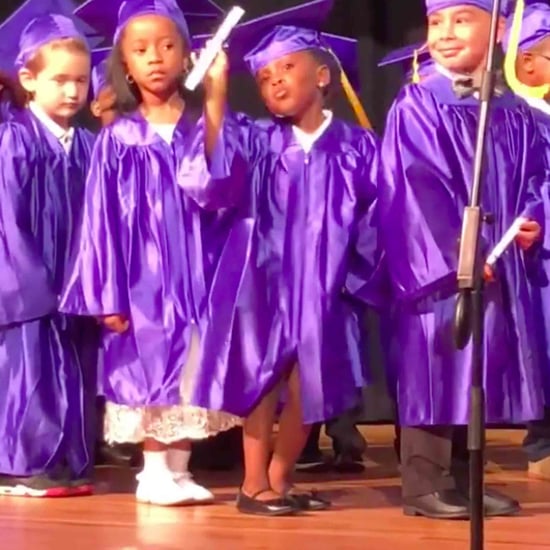 Girl Dances at Her Preschool Graduation Ceremony