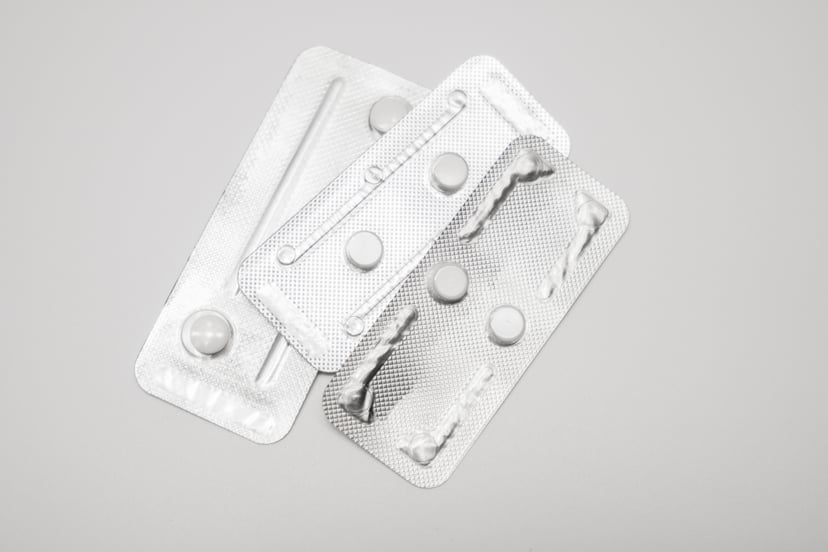 Emergency contraceptive pills on white background