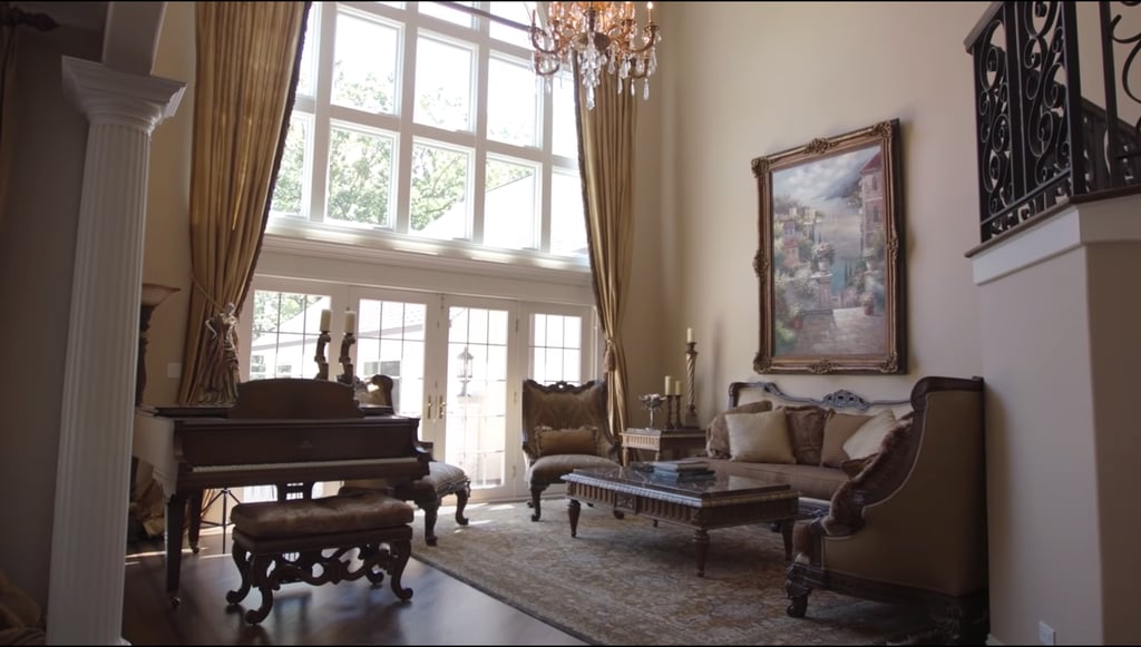 Pippen's great room is what I imagine a palace looks like. There's a piano, ornate furniture, an entire wall of windows, and a beautiful painting. He doesn't spend much time here, calling it "a wasted room," but if he ever needs someone to use that space, I'd be happy oblige!