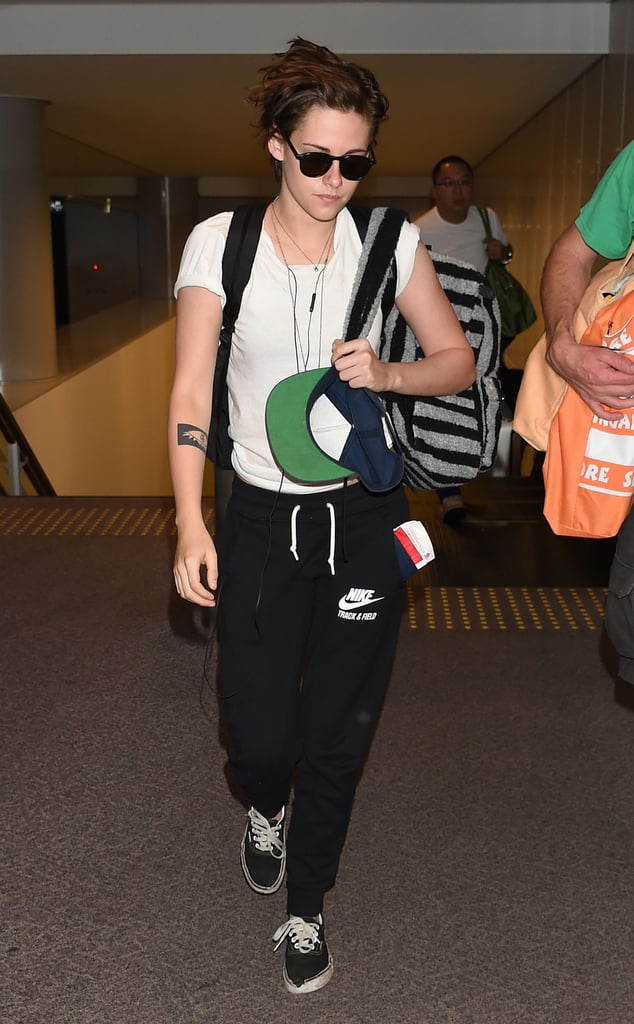 Kristen Stewart walked through Narita International Airport near Tokyo on Saturday.