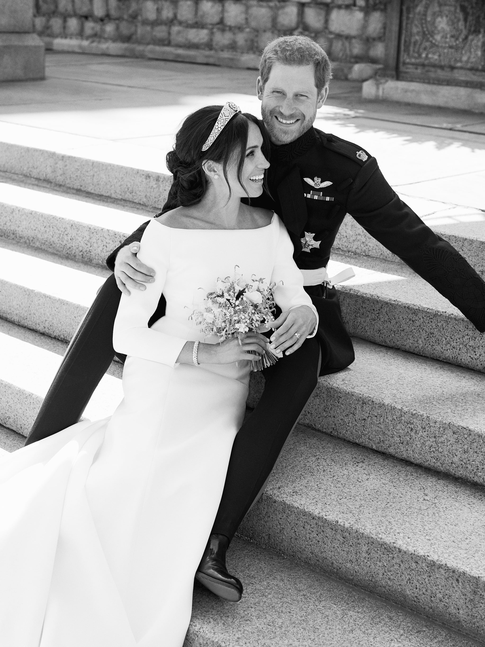 WINDSOR, UNITED KINGDOM - MAY 19: In this handout image released by the Duke and Duchess of Sussex, the Duke and Duchess pictured together in an official wedding photograph on the East Terrace of Windsor Castle on May 19, 2018 in Windsor, England. (Photo by Alexi Lubomirski/The Duke and Duchess of Sussex via Getty Images) NOTE - BLACK AND WHITE ONLY. NEWS EDITORIAL USE ONLY. NO COMMERCIAL USE. NO MERCHANDISING, ADVERTISING, SOUVENIRS, MEMORABILIA or COLOURABLY SIMILAR. NOT FOR USE AFTER 31 DECEMBER, 2018 WITHOUT PRIOR PERMISSION FROM KENSINGTON PALACE. NO CROPPING. Copyright in the photograph is vested in The Duke and Duchess of Sussex. Publications are asked to credit the photographs to Alexi Lubomirski. No charge should be made for the supply, release or publication of the photograph. The photograph must not be digitally enhanced, manipulated or modified in any manner or form and must include all of the individuals in the photograph when published.