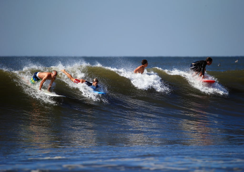 Surfers caught a wave in Long Beach, NY, after Hurricane Cristobal brought big swells to the area.